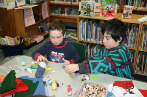 Youngsters were making sock puppets in Belfountain last Thursday. Matt O'Toole, 5, and his brother Tom, 7, were busy with the decorations.