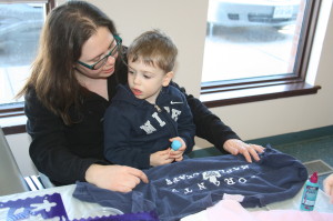 The various branches of Caledon Public Library hosted plenty of activities last week to keep youngsters busy during March break. The fun included this Great T-shirt Recycle at the Alton branch. Monique Seguin of Alton was helping her son Cameron Hardman, 3, work on his creation.