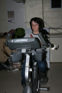 Luca Facchini, 10, of Bolton was working hard on this exercise bike to help provide power for some of the attractions. 