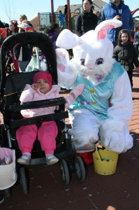 Easter fun in SouthFields Village Caledon Fire and Emergency Services held an Easter egg hunt, along with other fun activities, Saturday in SouthFields Village. The area was packed with families having a good time. Rola Hantzis was helping her son Christos, 2, find lots of eggs. The Easter Bunny was on hand to greet his friends, like nine-month-old Julia Giuliani. Photos by Bill Rea 