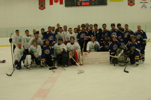 Caledon Community Services (CCS) was the beneficiary Sunday night of a charity hockey game featuring a team from Garden Foods in Bolton taking on a squad from Caledon OPP. The evening ended with the presentation of a cheque for $10,000 to CCS.