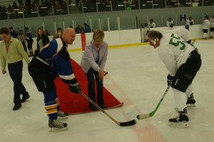 Garden Foods proprietor Piero Carbone, who had moments earlier taken a pie in the face from one of his OPP opponents, took the ceremonial face-off with Constable Mike Scanlan. Mayor Marolyn Morrison dropped the puck. Photos by Bill Rea 