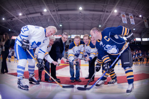 Toronto Maple Leafs Alumni captain Darryl Sittler faced Osler Crusaders captain Tony Santos for the opening faceoff in the recent hockey game. Helping out with the puck drop were Simon Buttery of Carillion Services; Shawn Evans of CIBC; Osler President and CEO Matthew Anderson; Osler Foundation President and CEO Ken Mayhew; and Derek Dawson of the Brampton-Bramalea Kinsmen. Submitted photo