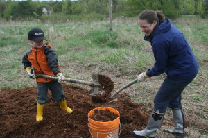 Dana Smitl of Bolton was getting some help gathering planting material from her son Carter Agius, 4.