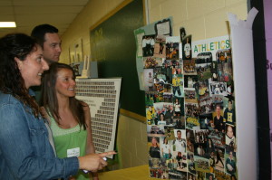 Displays of memorabilia were all over the halls of the school Saturday. Former Hall teachers Nicole Indelicate (also a graduate of the Class of ‘04) and Andrea Schrei (Class of ‘99) were looking over this display with current teacher Darren Morrison. 