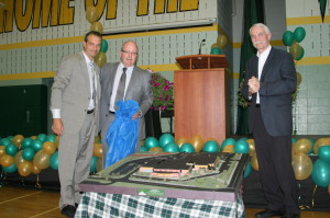 Trustee Frank DiCosola, Principal Ed McMahon and Superintendent Paul McMorrow helped unveil this model of the school building, which was created by the design class.