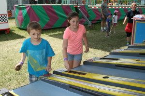 The weather turned out to be pretty good over the weekend; almost ideal for the annual Caledon Fair. It was a time for fun for everyone, and the midway was the source of much of that fun. Area resident Liam Unwin, 9, and his sister Julia, 11, were trying their skill at Skee ball.