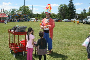 Kazoo the Clown from Waterloo was making balloon toys for the younger crowd.