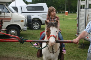 Kalhi Nivins, 4, of Palgrave was taking advantage of the pony rides at the Fair.