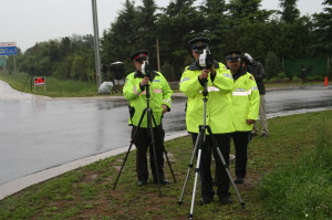 Peel Regional Police Constable Gord Middleton and Caledon OPP Constable Ian Michel were looking for speeders Monday morning in Caledon village. Photo by Bill Rea