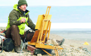 Cory Trépanier at work at his easel in the North. Submitted photo