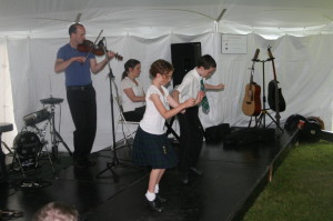 TASTE OF SCOTLAND AT ST. ANDREW'S It was time for a Scottish Afternoon Saturday at St. Andrew's Stone Church. There was plenty of food and entertainment to help celebrate the occasion, including from Chandra Leahy of Chandra's School of Dance in Orangeville. She is seen here with her husband Frank as their children Aliyah and Xavier performed. Photo by Bill Rea 