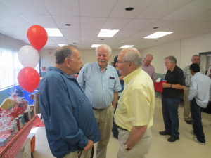 Wayne Easter chatted with Caledon Councillors Richard Whitehead and Richard Paterak in Mono Mills Saturday.