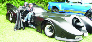 There were some fancy cars at the Fairgrounds, including this replica of the Batmobile, driven by Glen McCullagh of Orangeville. He's seen here with Colin Boardman, 4 of Alton.