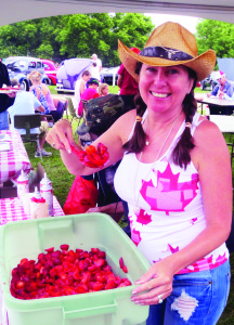 Angie Saylors was serving up the strawberries at the pancake breakfast at the Caledon Fairgrounds.
