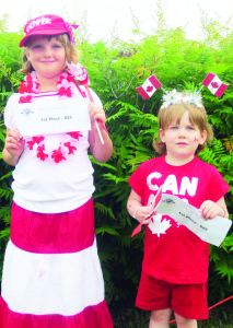 Megan Vaccaro, 7, of Brampton, and Alison Schmidt, 3, of Orangeville, tied for the best Canada Day costumes at the Caledon Fairgrounds.