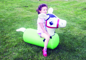 There was lots of family fun at the launch of the countdown. Selena Kenedi, 4, of Bolton was trying out the Horse Hop.        Photos by Bill Rea