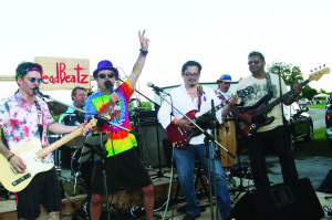 Bramalea Road resident Steve Anderson was right in the mood Saturday as he hosted the second edition of CaledonStock in support of Cystic Fibrosis Canada. The evening included people dressed as hippies and flower children rocking out to appropriate music of the '60s. Anderson is seen here on stage with The DeadBeatz, which included Ziggy, Steve Gale, Miguel Readegui, Joe Brubaker and Loy Fernandes. Turn to page 5 for more on CaledonStock. Photo by Bill Rea