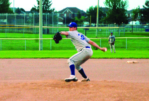Bolton Dodgers pitcher Kyler Orvis goes into the wind-up in last Wednesday night's game against the Mansfield Cubs at North Hill Park in Bolton. The Dodgers pulled off a seventh-inning rally to leave with a 3-2 victory. Photo by Brian Lockhart