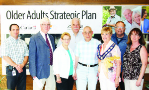 Dufferin-Caledon MP David Tilson was joined by Carol Kidd and Harvey Rutter of the Caledon Seniors' Advisory Committee for the recent funding announcement, along with Mayor Marolyn Morrison and Councillors Rob Mezzapelli, Richard Paterak, Richard Whitehead and Patti Foley. Photo by Nick Fernades