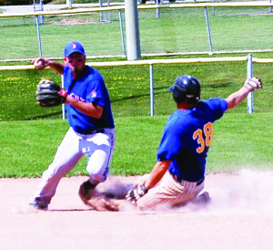 Bolton Brewer base runner Pat Warden slides into second base during the third inning of Sunday's NDBL playoff game against the New Lowell Knights. The Brewers went on to win the first game of the series 5-3. Photo by Brian Lockhart