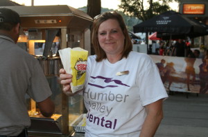 Susan Smythe, of Humber Valley Dental, was among those passing out popcorn.