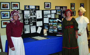 The Caledon Townhall Players were participating in the recent Doors Open event as part of the observances of their 50th anniversary. Helen Mason and Fay McCrea were representing Caledon Village Heritage, along with Players' President Linda Smith. Photo by Bill Rea