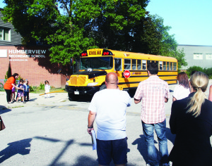 Getting used to school buses This week, local youngsters are going to be back on school buses, some for the first time. The local school boards hosted a Young Rider Orientation Day last Saturday at various locations, including Humberview Secondary School in Bolton. With help from parents, Liz Moody of Parkview Transit gave some youngsters instruction on what to do when getting off a bus, before helping another batch of kids get on for a ride around the neighbourhood. Those students included Matteo Scarpa, 4, from Bolton and Aaron Taylor, 3, of Valleywood. Photos by Bill Rea