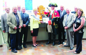 Mayor Marolyn Morrison congratulated Town Crier Andrew Welch on his recent success, accompanied by Councillors Nick deBoer, Gord McClure, Allan Thompson, Rob Mezzapelli, Richard Paterak, Doug Beffort, Richard Whitehead and Patti Foley. Photo by Bill Rea