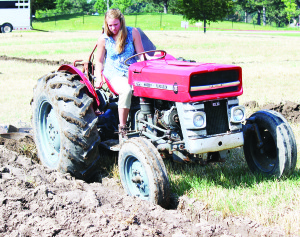 Palgrave area resident Victoria Wilhelm was showing her plowing skill as she was a contestant for Peel-Dufferin Queen of the Furrow. Photos by Bill Rea