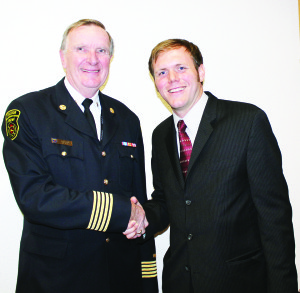 Fire Chief Terry Irwin with the department's new chaplain Pastor Jeff Enns.