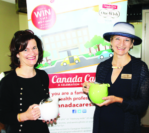 SERVING TEA TO HONOUR CAREGIVERS Canada Cares Founder Caroline Tapp-McDougall and Chair Katherine Atkinson were helping with the serving of high tea recently at the Terra Cotta Tea Room. The event was a fundraiser for Canada Cares, which is a group that supports and thanks family and professional caregivers. Photo by Bill Rea