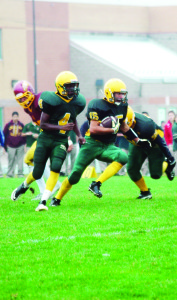 Wolfpack ball carrier Nicholas Ristucci sprints down field with some back-up from Philip Hasfal during Friday's home game against the Cardinal Ambrozic Riverhawks. The Wolfpack left he field with an 8-0 win. Photo by Brian Lockhart