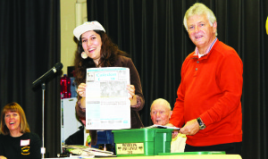 Former student Leanne Capiello and former principal Terry Griffiths opened a time capsule that had been created for Macville's 40th anniversary 10 years ago. Among the items it contained was a copy of the Citizen from the time.