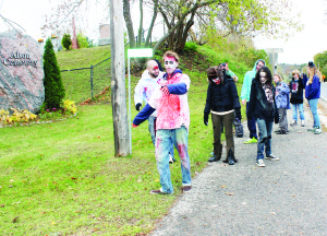 ZOMBIES LOOSE IN ALTON Alton resident Derek Masters came up with an innovative way to stir up some excitement in the community Sunday in honour of Halloween. He got some friends together and they staggered through the hamlet like zombies. “Just doing it to get the town excited,” he said. Photo by Bill Rea