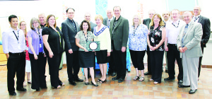 Caledon's Chief Financial Officer Ron Kaufman credited the work of the team in the Corporate Services Department for winning the Distinguished Budget Presentation Award for the second year in a row. The team members recently received congratulations from Mayor Marolyn Morrison and Town councillors. Seen here are Phillip Li; Barb Johnson; Lori Eagleson; Councillor Gord McClure; Elizabeth Lane; Fuwing Wong; Peggy Tollett; Councillor Rob Mezzapelli; Morrison; Councillor Richard Paterak; Kaufman; Hillary Bryers; Councillors Richard Whitehead, Patti Foley and Nick deBoer; Kevin Jackson: and Councillors Doug Beffort and Allan Thompson Photo by Bill Rea