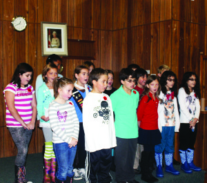 These students from Alton Public School sang as part of the services at the Legion hall Sunday.