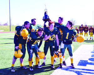 The Robert F. Hall Wolfpack football team claimed the Tier 2 ROPSSAA championship with  a 7-6 win over the Cardinal Ambrosic Riverhawks at Centennial Stadium in Etobicoke last Wednesday. Team captains, Jake Smith, Tevin Bowen, Jake Monk, Jake Sutherland and Nick Ristucci, raise the cup during post game celebrations.