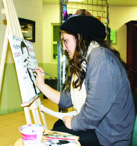 There was artistic work going on in the halls. Visual arts student Alissa Condotta was working on this acrylic creation.