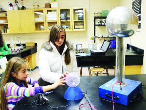 Students planning to attend Hall next year got to see some of the activities that are part of academic life there. Sophiarose Bezant of Orangeville is hoping to attend the school next year. She was joined by her sister Isabella as they studied the static discharge from this Plasma Ball. 