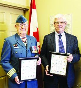 Dufferin-Caledon MP David Tilson presetned certificates to Bill Coyle on his appointment as Honorary Colonel of 16 Wing Headquarters Borden and receiving an Honorary Doctorate from the Royal Military College of Canada. Photo by Bill Rea