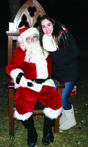 Rotarians host holiday celebration The annual tree-lighting event, hosted by the Rotary Club of Palgrave, was held last Saturday with the community out to enjoy the sights and sounds of the season. Santa Claus was on hand to meet his many friends, including Victoria Costacurta, who is a Rotary Exchange Student from Brazil. There was the opportunity to make crafts. Bridget Bonnici was helping Jonathan Boccia make a bird feeder. Photos by Bill Rea