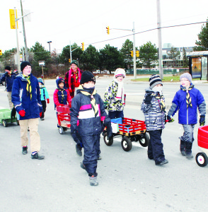 Members of the 1st Bolton Cub Scouts were collecting contributions to the Caledon Food Bank.