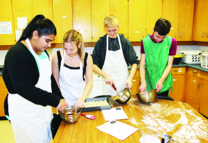 There was lots cooking in the family studies area. Tanisha Chouhan, Lauren O'Malley, Jason Kluge and Myles Pritchard were making cinnamon buns.