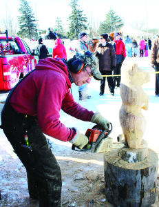 Wood carver Kevin Pinkney from French River attracted lots of attention as he worked on his creation of this critter.