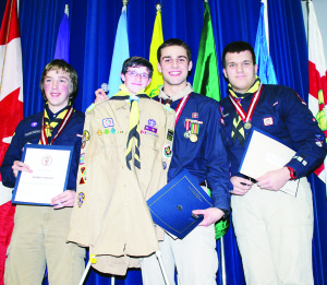 The 1st Bolton Scouts held their annual Parent and Youth Awards Banquet Saturday at Humberview Secondary School. These Venturers have been progressing through the Duke of Edinburgh Award Program. Harry Hautot, who's completed the Gold level, was not able to attend the banquet, but some creativity enabled him to be represented in a form, seen here with Jarid White (Bronze) and Alexander Court and Robert Matson (Gold).