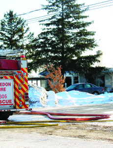NO INJURIES IN MONDAY HOUSE FIRE Monday morning's frigid temperatures made things difficult for Caledon firefighters, but they were able to bring this house fire on King Street in Sandhill under control. Caledon Fire and Emergency Services report the 9-1-1 call came in a couple of minutes before 5 a.m. While crews from the Caledon East station were on their way, they were informed that flames could be seen coming through the roof. It was also not clear if anyone was in the house. Upon arrival, the firefighters started an offensive action involving search and rescue, and also set up a rural shuttle operation. As things got worse in the house, crews were forced to withdraw and start a defensive fire attack, utilizing several large handlines to control the fire. The blaze was brought under control at about 8:40 a.m. There were no injuries reported, and the cause of the fire is still under investigation. Damage has been estimated at $400,000. Crews from the fire stations in Caledon East, Inglewood, Cheltenham, Bolton and Valleywood were involved in fighting this fire, along with Caledon OPP, Hydro One and Peel EMS. Photo by Bill Rea