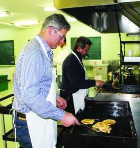 Whether they're for breakfast, lunch or dinner, pancakes were in abundant supply this week throughout Caledon. Mayfield United Church hosted their annual Pancake Supper Tuesday. Philip Armstrong and Neil Whiteford were busy in the kitchen keeping up with the demand.