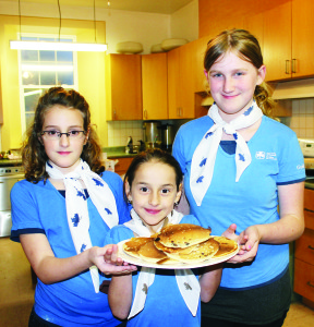 Jenna Figueroa of the 1st Inglewood Brownies, along with Guides Abbey Kennedy and April McDonald were helping to serve the crowds at Knox United Church in Caledon village.