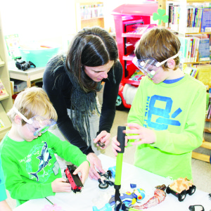Toy hacking was one of the fun activities hosted by Caledon Public Library last Tuesday at the Margaret Dunn Valleywood branch as part of March break. Participants got the chance to make their own toys by taking some apart and using the parts to assemble new ones. Marion Wood of Caledon East assisted her sons Jake, 9, and Theo, 6, as they were hard at work taking things apart.